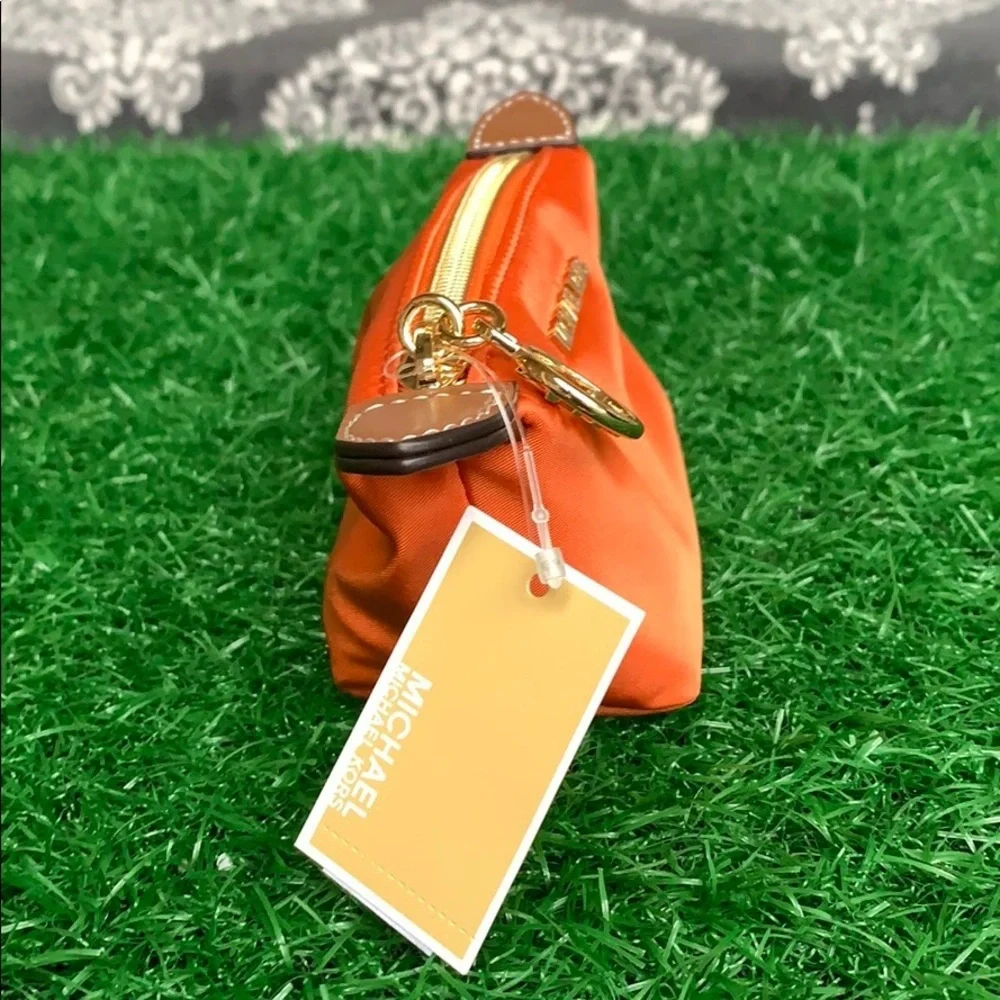 MICHAEL KORS TRAVEL XS POUCH TANGERINE - Picture 15 of 16